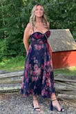 This dress was beautiful. I got many compliments, but I couldn't wait to get it off. The material is so itchy. Around the waist inside where it is sewn was so irritating. I was constantly trying to adjust so it wouldn't bother me. The other big problem was the straps. They are adjustable but they did not stay adjusted. Almost had a wardrobe malfunction. Right after the wedding ceremony, they started falling off my shoulders. And we could not get them to stay tight. As beautiful as it was to look at, I would not recommend this dress. And I hate to say but it kind of ruined my night. - Jaclyn S.
