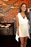 This was the perfect dress for my bridal shower. The bottom half fit great but the top was a little loose so I decided to get it tailored to fit tighter around my chest area. This dress was classy and flirty which was exactly what I was looking for. - Kelly S.