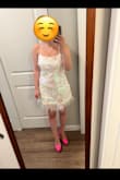 So excited to wear this for my Bach party! It's mostly white with a little pink. The small would have been too tight but the medium lays and fits just right. I'm a 34B/C. - Alexandra S.