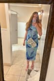 I love this dress! It fits perfectly, and the pattern and colors look just like the picture. The fabric has a little stretch to it which makes it super comfortable, and the ruching makes it very flattering. I wore it to a wedding and received a ton of compliments. - Maggie H.