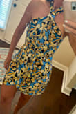 Love the print, fabric and cut were just as expected. The only issue I had was the halter straps were very long. Rather than cutting or altering it, I decided to return. I couldn't get the bow or knot to lay flat enough to wear it with my hair down. - Theresa B.