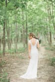 This dress is absolutely stunning. It's timeless and elegant. I did take it to a seamstress for a few alterations -- I had the dress hemmed, shortened the straps, and also had cups added. After these few alterations, it fit perfectly. - Ashley W.