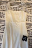 Loved it! The material is very nice and the dress is very flattering. - Selena V.
