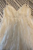 Super cute summer dress! Good quality and perfect length. - Selena V.