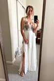 This dress is for the welcome dinner for my wedding in Belize and it's perfect. High quality materials and well-made. Because it's my wedding I will have the dress altered a tiny bit to fit just right (mainly length), but I could have left it as is and still been happy. - Kerry S.