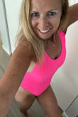 The bathing suit is cute on, love the pink... very pretty.  I like that the back is low enough to get some sun, but not too bare that I feel overexposed.   Beautiful material. I ordered one in black and red as well, very stylish and great price point. - Ann F.