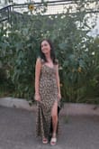 Fits perfectly and was also the perfect length with platform wedges. Kept me cool on a hot night, even with the length. Also has some stretch, very little actually, but enough to feel comfortable. Super cute. - Samantha S.