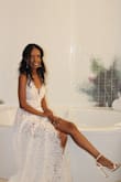 This dress is so beautiful and comfortable!! Wore it to my wedding in Las Vegas, and I had so many compliments about how elegant and sexy it looked. To all the brides thinking of buying this dress, please do not hesitate!  You will not regret your purchase. - Angela U.