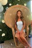 I bought this beautiful dress for my bridal shower. It was a little big for an XS. I had it taken in a tad on the waist. - Alexa H.