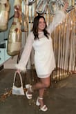 This dress is very short so I exchanged for a bigger size. Wore to my bachelorette party in Miami. I wish I had another reason to wear it! - Kelsey S.