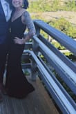 This dress is perfect, such a steal for $90!! I'm short AF and obviously needed to get it hemmed but it fit TTS for me, even with such a short torso. Here's the stipulation, you need help buttoning/unbuttoning the back. My husband was in a wedding and thank goodness for the angel in the lobby who buttoned me in on my way out the door. I have extremely flexible arms and had to throw in the towel after 10min trying on my own. My husband was slightly over served and couldn't understand how to unbutton it, back to alternations she goes. Small price to pay for a perfect look! - Courtney O.