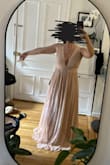 Very disappointed in this dress. It looks nothing like the picture advertised. The color is more of a beige/taupe; the texture is different; there's barely a slit; it's way too long and puffy and just overall a catfish of a dress. Not only did I not get refunded the full amount paid, but I also had to pay 25$ to ship it back. Would never order from Lulus again, unfortunately. - Michelle D.