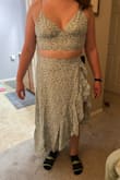 Got it for my honeymoon to Hawaii and it's perfect!!! The skirt is a wrap style so I love that I can make it fit perfectly, and the top is so comfortable with the elastic back!! I feel like my bust is perfect. I think a B to C cup is ideal as it fills the cups perfectly but doesn't require a bunch of support. (Top straps are adjustable) The material is perfect! Not too thin or too thick. Highly recommend ordering!! As a tall and slightly large girl, the large size was perfect. - Marci J.