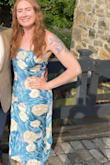 I absolutely loved this dress! It was perfect for an outdoor wedding in the summer. The material was very light and breathable. It hugged me in all the right places! Straps are not adjustable. - Haley P.