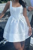 Chose this last minute for my elopement. Classy, sexy. comfortable, and appropriate for the occasion (not too extravagant but very bridal). Would 100% choose again except... #1: The zipper was a bit kinked and would cause a mild panic attack when we reached a particular section of the bodice. #2: It was double steamed and there were still large wrinkles that wouldn't budge, due to the way the product was folded/shipped. Overall I'd recommend, just make sure you have the time/patience to steam thoroughly. - Lailah S.