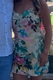 This dress is a great purchase for vacation. The pattern paired with the halter neck is super fun. The material is very lightweight (it is almost slip-like) which some people may not like, but I loved it for a warm vacation destination. I did use fashion tape on the top just to be safe. - Courtney M.