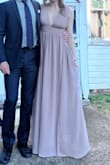 So I actually ended up ordering a size xs and returned the small. I found the small to be too loose at the shoulders and waist. An xs was perfect. My butt and hips are typically not an xs, but because the gown is so flowy, there is plenty of room. The length is super long, but I rocked platform heels to compensate. - Kelsey W.