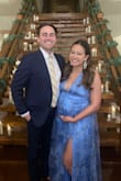 I'm 27 weeks and bought this for a wedding. I had to safety pin it in a few spots, but I got so many compliments and felt so pretty in it. It flows over the bump so well! - Hannah R.