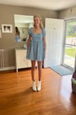 This was one of five dresses my granddaughter wore for her senior photo shoot. Unfortunately, I don't have a photographer's picture, but I have one we took at home. It is adorable!!! - Evelyn D.