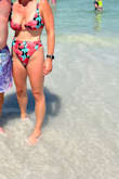 Cute suit! I usually buy a size medium in bottoms but I could have sized down because of the bum.  It's pretty cheeky which is cute but when the suit was wet, it sagged a bit on me. - Christine P.