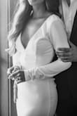 I ordered this dress for my elopement ceremony. It was absolutely stunning! I'm small and lean, and the shoulders and bust in XS size were too big for me. Nothing a little tailoring couldn't fix! We took some material off of the train and used it for a bow in the back, which held the back/shoulders together since they were sliding off. The sleeves were also a little long for me, but overall I'm absolutely in love with this dress! - Morgan A.