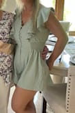 The romper fits well and is a nice color. My only complaint is 3 buttons popped off the first time I wore it. Luckily, I was wearing a shirt under, or I'd be in trouble! - Kinga C.