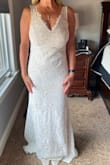Bought an off-the-rack dress from a bridal shop for my second wedding and realized I wasn't in love with the way it looked on me. Decided to order a few dresses from Lulu's after I saw their return policy. Fell in love with this one the second I put it on. It's comfortable, doesn't show that much cleavage and looks classy and simple. I will be able to wear this all night. I had my seamstress bustle the small train, sew in bra cups (I am a 34DD), and take it in a little in the leg area and shorten it just a little. - Lynne