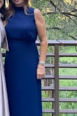 I had read the reviews and was very happy with this dress. It was exactly as everyone described- fabric was light and it fit beautifully. The wedding attire was "cocktail" so I kept it simple. Was going to wear a multiple string pearl necklace but decided not too so as not to be overdressed. Wore 3 in heels and did not need any alterations. Originally thought I might have to wear a different bra so that straps would not show, but that was not necessary. Got compliments on the dress and color. - Sandra A.