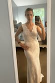 I really like this dress. I was looking for an elegant lace dress that was not so low cut and something that old fit nicely. 
It's perfect for what I was looking for, the last was nice as well, not cheap looking. I am looking forward to wearing the dress in the near future. - Amy M.
