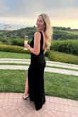 This dress is stunning. It was too long but a quick hem and I got so many compliments at a black tie wedding - Jessica C.