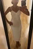 I bought this dress for my beach wedding in Hawaii this summer. I love this dress it makes me feel sexy which is hard for dresses to do with my body. It's fun and easy to move around in because it is a stretchy material. I really wanted to give it 5 stars but the dress seems to coming start where the zipper is sewn onto the dress. - Chelsea V.