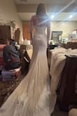 It was a good dress and nice material and the back was gorgeous! But the sleeves were not sewn on very well and one side was very loose and about to pop off and was holding on by a string. Hard to lift arms. - Aubrey S.