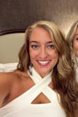 I want this in all colors. It's a great material, has a little stretch, and is so flattering. I love the crisscross around the neck, makes a simple top look sexy. - Jenna Y.