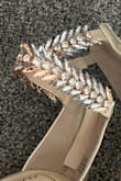 These didn't last one night. The jewels kept snagging my dress that I paid a lot of money beforehand on alterations and by the end of the night, half the gems had fallen out of the ankle straps. Terrible quality. - NICOLE M.