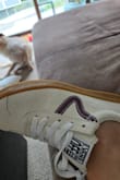 I LOVE THEM. However, I'd describe the suede-ish outer as more of a cream color than the white the pictures show. They're a little snug but that could be my feet after having a baby! - Cathleen H.