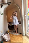 I love this dress!! It's so comfortable and very flattering. I have a wide rib cage so I was worried a medium wouldn't fit, but the middle part is stretchy. Perfect summer dress! - Becca P.