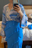 Exceeded my expectations! Not my usual style, but I took a chance and I'm glad I did. I can wear it buttoned up as a shirt, or as a wrap over a dress for a wedding, which is the reason I bought it. Just wish the shorts were still available. - Jelly S.
