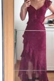 The dress is a bit too long, I needed to put heels to wear it. Also, one sleeve can be adjust however the other one cannot, it's a shame...
Besides those problems, the dress is absolutely lovely ! - Clarisse D.