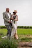 We had a small wedding for our official marriage since Bali can't legally marry you. We didn't want to do the typical thing and get married at the courthouse, so we figured we'd do a small wedding at our family's vineyard first. This dress was a showstopper! It was absolutely perfect for what it is - no, it's not a Vera Wang so don't expect that level of quality or style. However, for $109, you will be shocked by what you get. The gal who's 5'3 and said "this isn't for short people" - clearly ordered the wrong size and has terrible posture (sorry, but stand up honey!) this dress hugs and gives you curves, but will also soften them because of how the fabric hangs. Easy to walk in, move, you're not going to fall out. 10/10 would recommend. - Jennifer V.