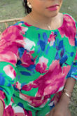 I receive a lot of compliments. The color is very bright, not see through, and the material is thin. It's good for the summer. I am in love with it. I wish I had other colors. - Vanessa M.