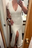 I've been engaged for seven months but decided to elope with less than two weeks to plan. I ordered three dresses from Lulus and tried them all on four days out. This dress was my least favorite online but it was my favorite on. It's very well made, beautifully detailed, and very flattering. Perfection! - Lacy M.