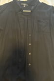 I have always purchased these shirts repeatedly in all the colors available. But the last time I purchased them, after 3 washes a button from each shirt fell off. I'm not one to sew or go out and find matching string for it so it pains me for 3 of my $30 plus shirts to go to waste. - Mayra C.