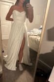 It was a beautiful dress and well made, it fit perfectly. I just felt like my figure was drowning in it (a lot of people like this for a wedding dress, however I think I prefer more fitted). - Meagen G.