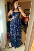 I had high hopes for this dress, but am disappointed. Overall, it runs big. The corset portion runs true to size, but the skirt is big. The skirt has so much extra fabric that it looks awkward, and poofs out. This dress would need significant hemming by anyone due to how excessively long it is. I'm 5'7" and had my highest heels on, and it still was dragging by inches. Overall, I would not recommend this dress. It swallows you. I thought about sizing down, but I do feel that the corset portion of the dress would be too snug. - Chelsea L.