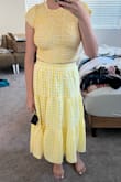 The print on the skirt is very bold, and the top is more solid yellow, I like the pieces separately, but the set is kind of awkward - Claire S.