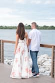 Bought this dress for my engagement photo. I fell in love after I tried it on. And knew it was the one after spending weeks trying to find the perfect engagement photo dress. The quality is amazing! The flow was beautiful. The photographer even commented on the dress. I wore sandals and the length is perfect on me considering I am almost 6 feet. It hovered slightly above floor. I stepped on it a few times accidentally. The bodice is a little too snug. But it made my girls look amazing. I could have gone with a medium for my girls, but medium was out of stock. I do NOT regret my purchase at all!! - Helen T.