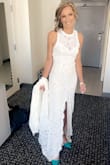 I saw this dress and fell in love with it! I ordered for my Feb garden wedding, and it was perfect! Note that there is no stretch in the material, so it fits snug. I moved the buttons at the back of the neck in a little, as it was a bit loose. Not a big fan of the liner (although it needs it) as there was a lot of lining material. I stitched it to the lace in the front slit, but it still seemed like too much loose material. Prob should have tried stitching it around the back too?  Other than that, this dress was perfect. I was very pleased with it, and so happy I came across Lulu's. 5'6, 119 lb, 34aa, 25w, 36 1/2 hips. - Sherri H.