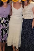 This top was the perfect piece for our post-wedding celebration with friends! I paired it with a white bodycon skirt and loved the look. I typically wear a small but a medium fit better. - Samantha P.