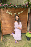 I wore it to a baby girl shower. Very pretty dress. I normally wear a large but sized down because I knew that a whole-body layered ruffle dress would normally make me look wider than I'd want to. I typically stay away from ruffle fabric because of this but glad I purchased this dress. Size M is perfect for me. - Mai V.