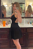 This dress is so flattering and cute. I love the open back in the low neckline that's perfect for the beach or dressing it up with accessories to make it more formal. - Laura T.